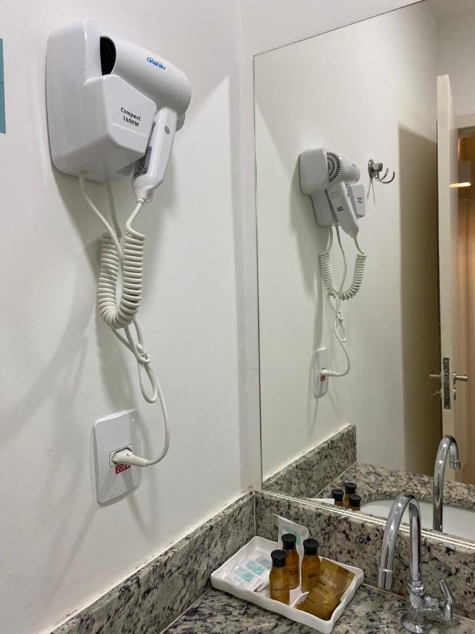 Hotel H2 Congonhas Congonhas  Esterno foto A hair dryer in a hotel room