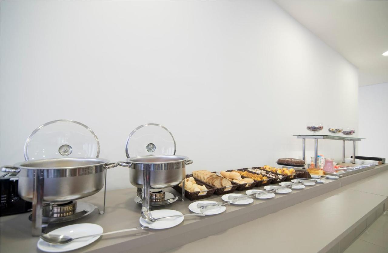 Hotel H2 Congonhas Congonhas  Esterno foto A buffet
